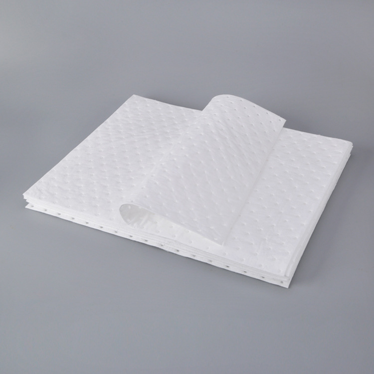 Layered oil-absorbing tablets